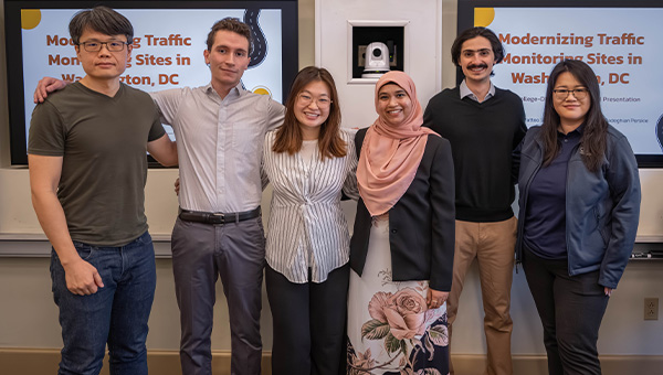 Samiha and her capstone team pose for a photo after their presentation.