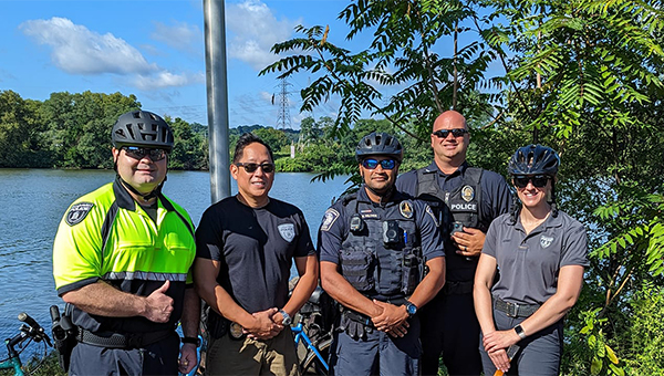 Police officers with a bike